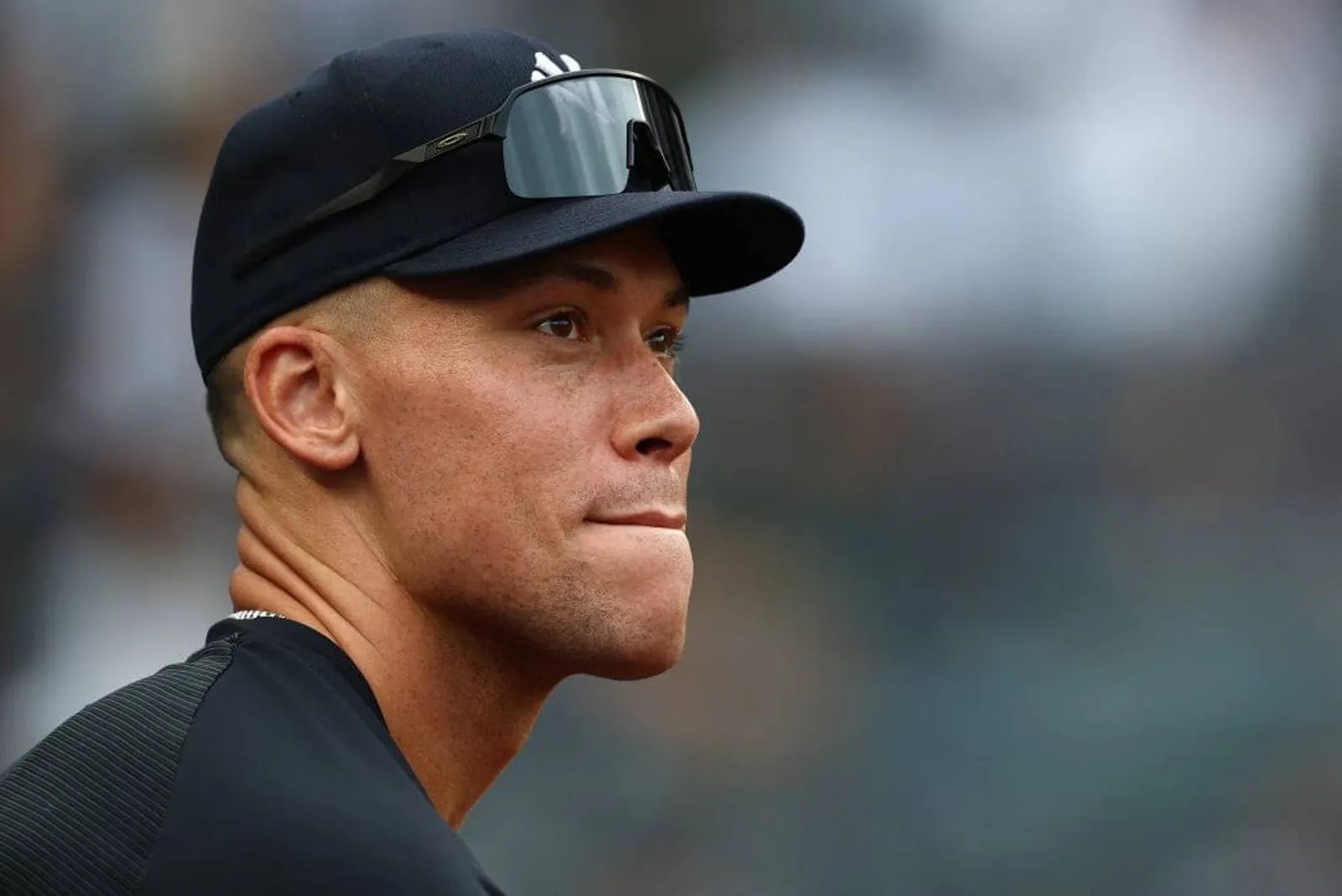 Aaron Judge looks on from the dugout during a game against the Boston Red Sox at Yankee Stadium.