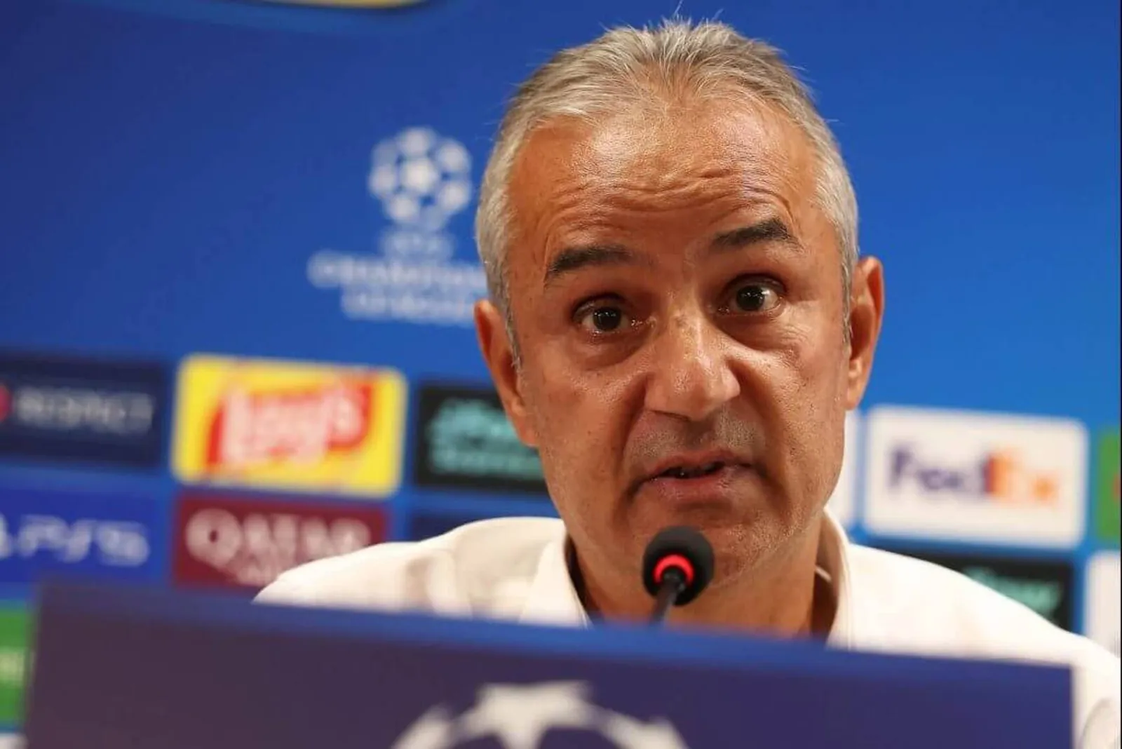 A headshot of Ismail Kartal speaking at a press conference